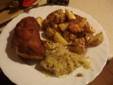 Zdjęcie potrawy Faszerowany schab z pieczonymi ziemniakami i kminkiem