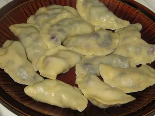 Pierogi z jagodami w śmietankowej polewie - 12
