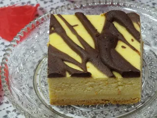 Pomarańczowy sernik z kakaową bezą - 16