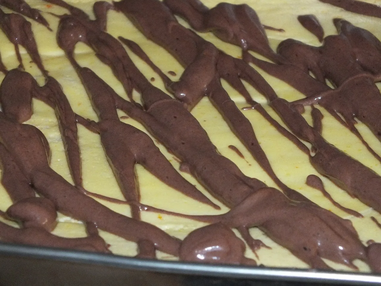 Pomarańczowy sernik z kakaową bezą
