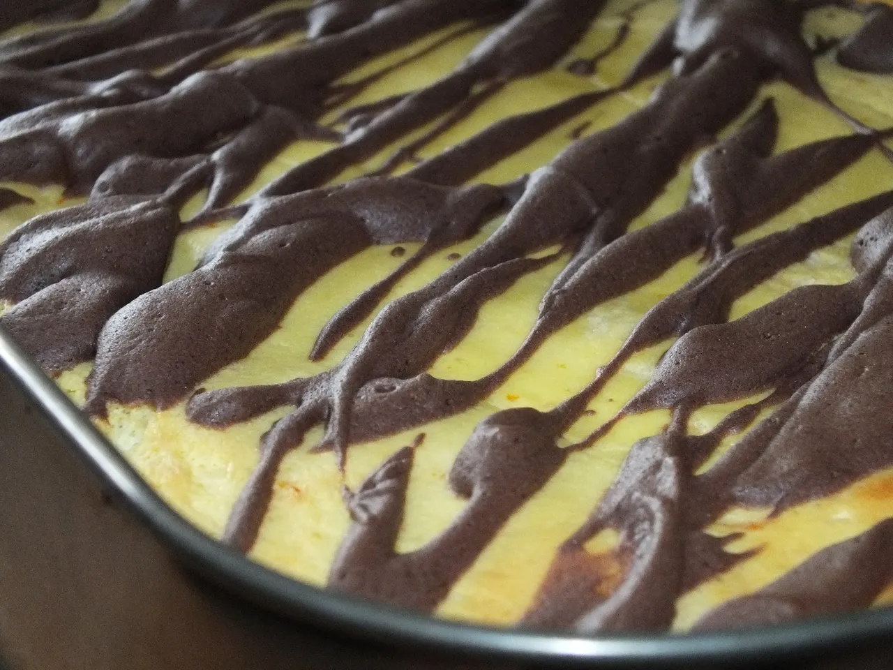 Pomarańczowy sernik z kakaową bezą